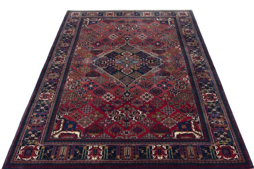 Surface texture of 1970s Joshagan rug with natural Wool and intricate pattern