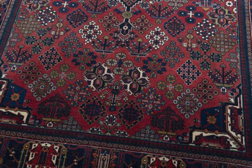 Close-up detail of 1970s Joshagan rug from Iran / Persia showing Wool weave
