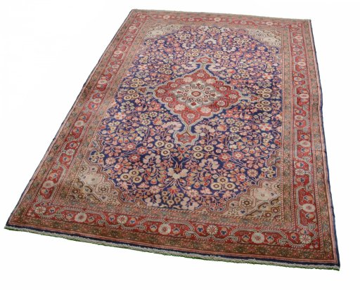 Close-up detail of 2000s Jozan rug from Iran / Persia showing Wool weave