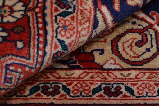 Close-up detail of 2000s Jozan rug from Iran / Persia showing Wool weave