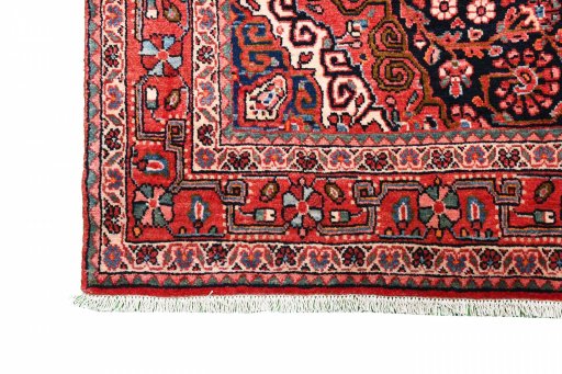 Corner detail of 1970s Jozan rug showing border pattern and Wool pile