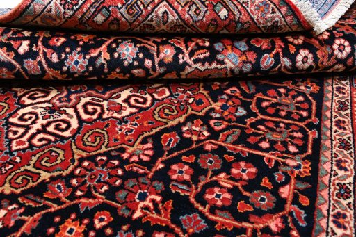 Close-up detail of 1970s Jozan rug from Iran / Persia showing Wool weave