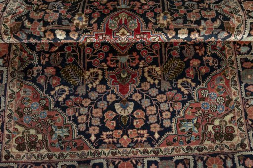 Corner detail of 1950s Jozan rug showing border pattern and Wool pile
