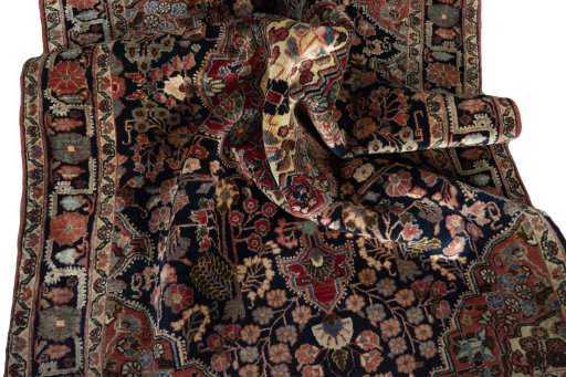 Close-up detail of 1950s Jozan rug from Iran / Persia showing Wool weave