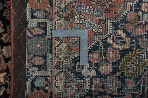 Surface texture of 1950s Jozan rug with natural Wool and intricate pattern