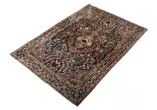 Corner detail of 1950s Jozan rug showing border pattern and Wool pile