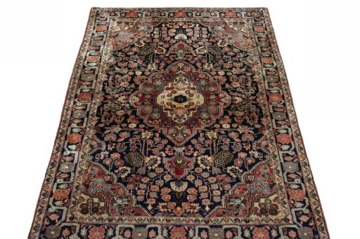 Surface texture of 1950s Jozan rug with natural Wool and intricate pattern