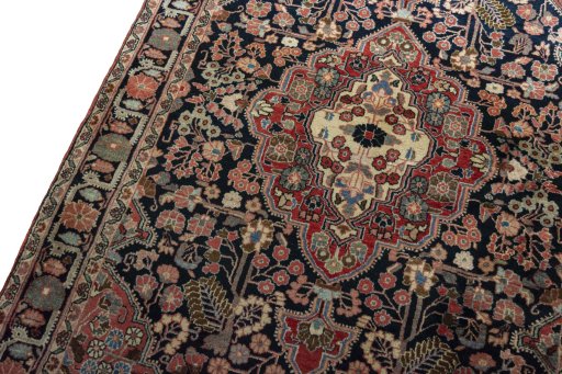 Backside of handmade 1950s Jozan rug showing knot structure and weave density