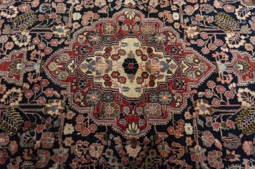 Central medallion detail of 1950s Jozan rug from Iran / Persia