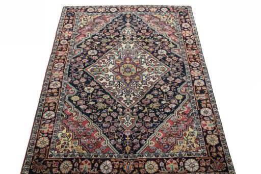 Surface texture of 1950s Jozan rug with natural Wool and intricate pattern
