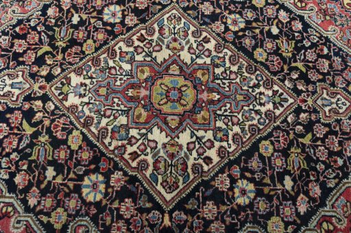 Central medallion detail of 1950s Jozan rug from Iran / Persia