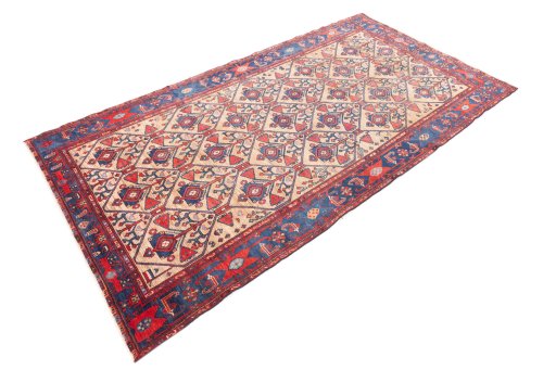 Corner detail of 1973s Koliai rug showing border pattern and Wool pile