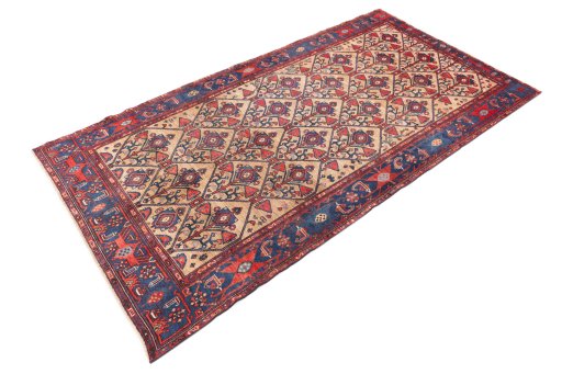 Close-up detail of 1973s Koliai rug from Iran / Persia showing Wool weave