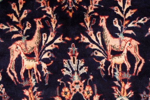 Corner detail of 1975s Koliai rug showing border pattern and Wool pile
