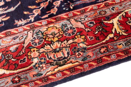 Backside of handmade 1975s Koliai rug showing knot structure and weave density
