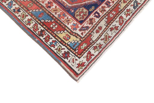 Backside of handmade 1900s Kurdi rug showing knot structure and weave density