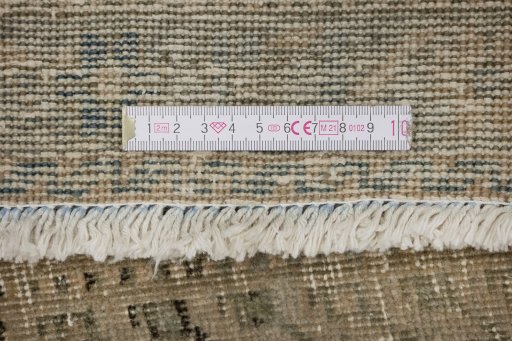 Corner detail of 1920s Kurdi rug showing border pattern and Wool pile