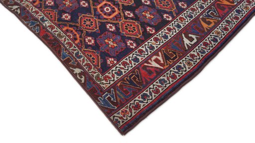 Backside of handmade 1990s Kurdi rug showing knot structure and weave density