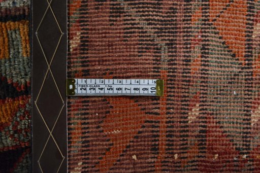 Surface texture of 2000s Kurdi rug with natural Wool and intricate pattern