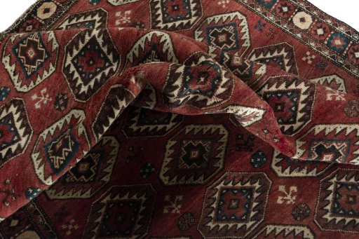 Corner detail of 1970s Kurdi rug showing border pattern and Wool pile
