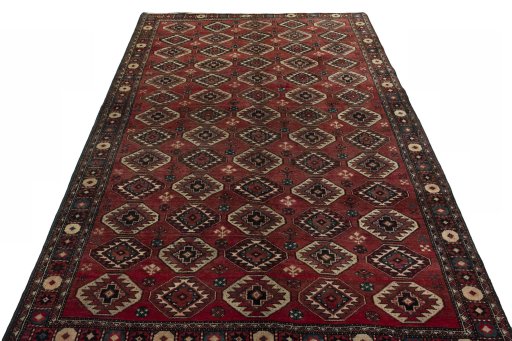 Surface texture of 1970s Kurdi rug with natural Wool and intricate pattern