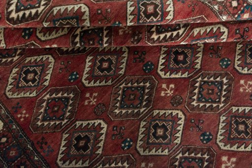 Full view of 1970s Kurdi rug from Iran / Persia, 259 × 170 cm in Red tones