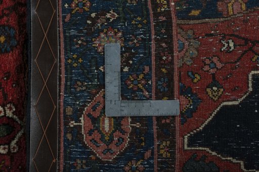 Backside of handmade 1950s Kurdi rug showing knot structure and weave density