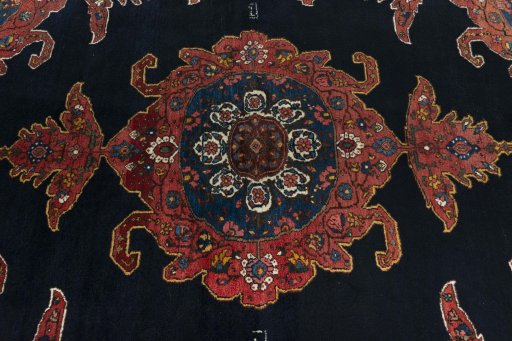 Central medallion detail of 1950s Kurdi rug from Iran / Persia