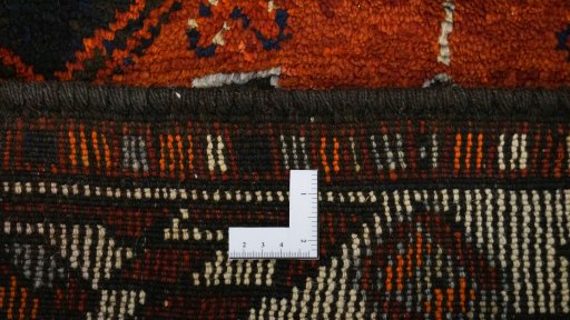 Corner detail of 1990s Kurdi rug showing border pattern and Wool pile