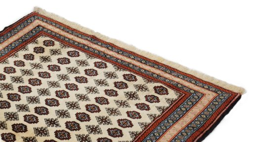 Surface texture of 1990s Kurdi rug with natural Wool and intricate pattern