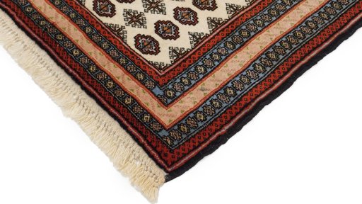 Backside of handmade 1990s Kurdi rug showing knot structure and weave density