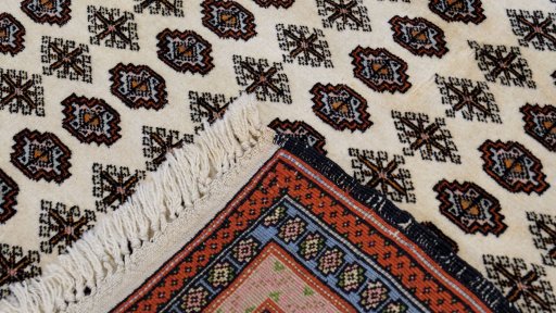 Close-up detail of 1990s Kurdi rug from Iran / Persia showing Wool weave