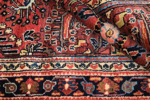 Corner detail of 1980s Lilian rug showing border pattern and Wool pile