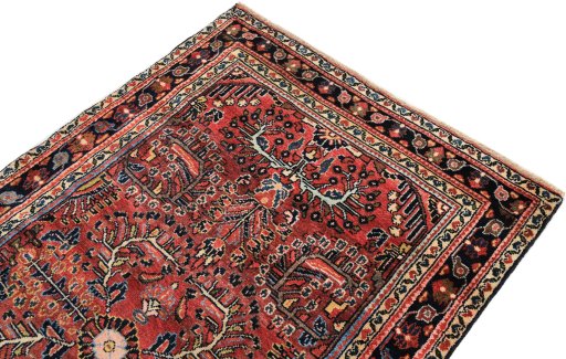 Surface texture of 1980s Lilian rug with natural Wool and intricate pattern