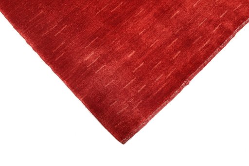 Backside of handmade New Lori rug showing knot structure and weave density