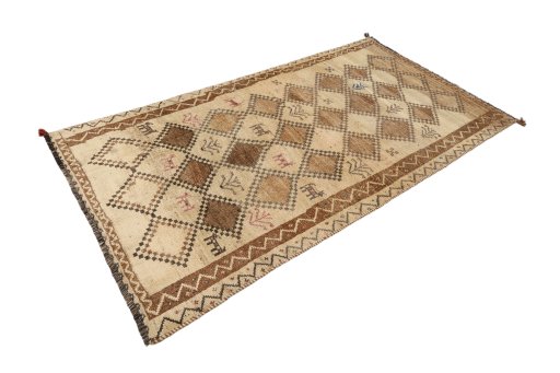 Corner detail of 1940s Lori rug showing border pattern and Wool pile