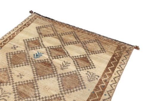 Surface texture of 1940s Lori rug with natural Wool and intricate pattern