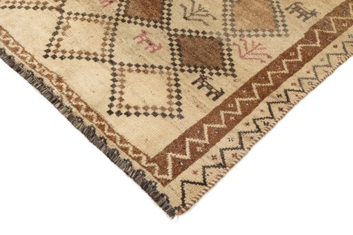 Backside of handmade 1940s Lori rug showing knot structure and weave density