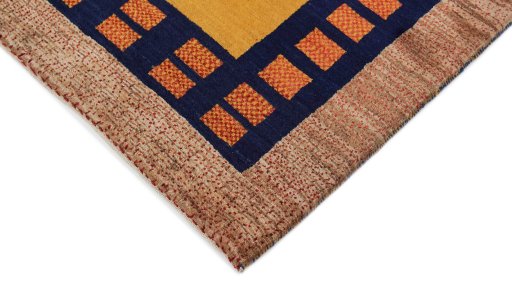Backside of handmade New Lori rug showing knot structure and weave density