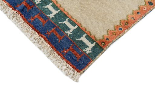 Backside of handmade New Lori rug showing knot structure and weave density