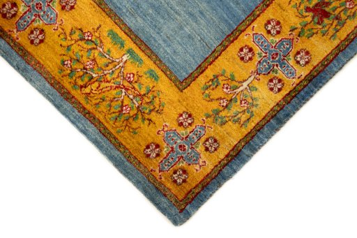 Backside of handmade 2010s Lori rug showing knot structure and weave density