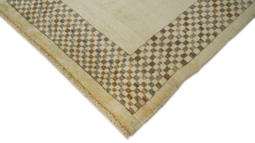 Backside of handmade New Lori rug showing knot structure and weave density