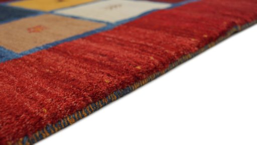 Backside of handmade New Lori rug showing knot structure and weave density