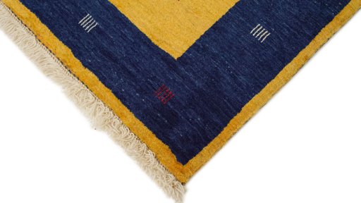 Backside of handmade New Lori rug showing knot structure and weave density