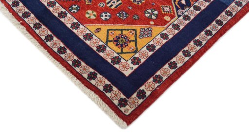 Backside of handmade New Lori rug showing knot structure and weave density