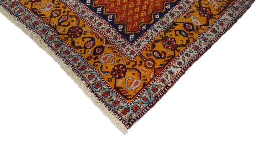 Backside of handmade New Lori rug showing knot structure and weave density