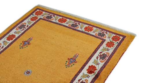 Surface texture of 1990s Lori rug with natural Wool and intricate pattern
