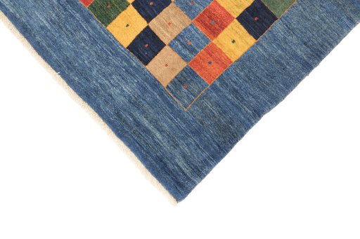 Backside of handmade New Lori rug showing knot structure and weave density