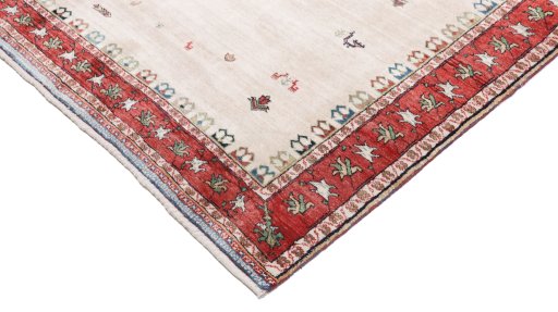 Backside of handmade New Lori rug showing knot structure and weave density