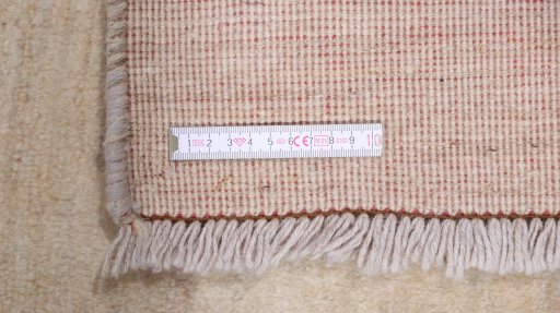 Corner detail of 1980s Lori rug showing border pattern and Wool pile